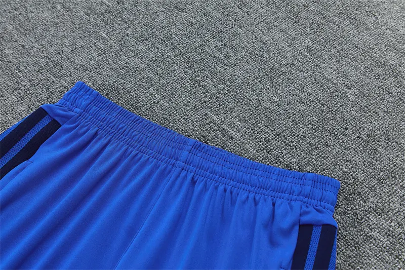 2026-27 Manchester United light blue half-zip training jersey