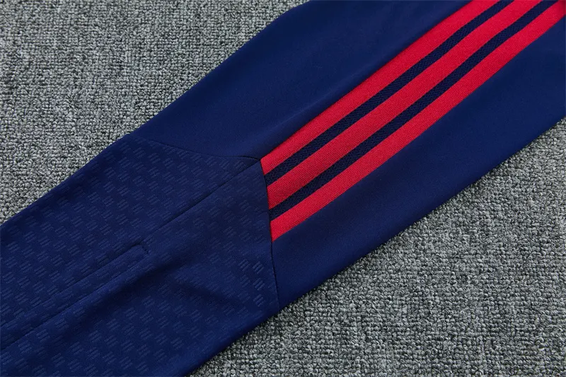 2026-27 Arsenal royal blue half-zip training kit