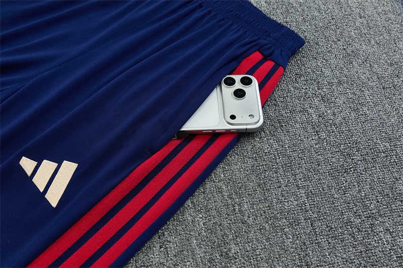 2026-27 Arsenal royal blue half-zip training kit