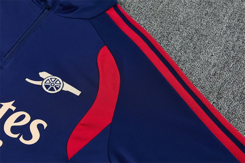 2026-27 Arsenal royal blue half-zip training kit