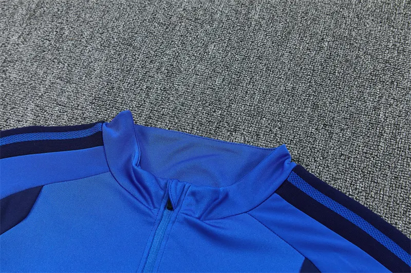 2026-27 Manchester United light blue half-zip training jersey