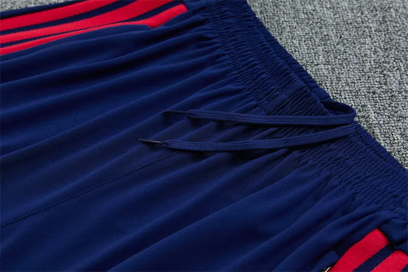 2026-27 Arsenal royal blue half-zip training kit