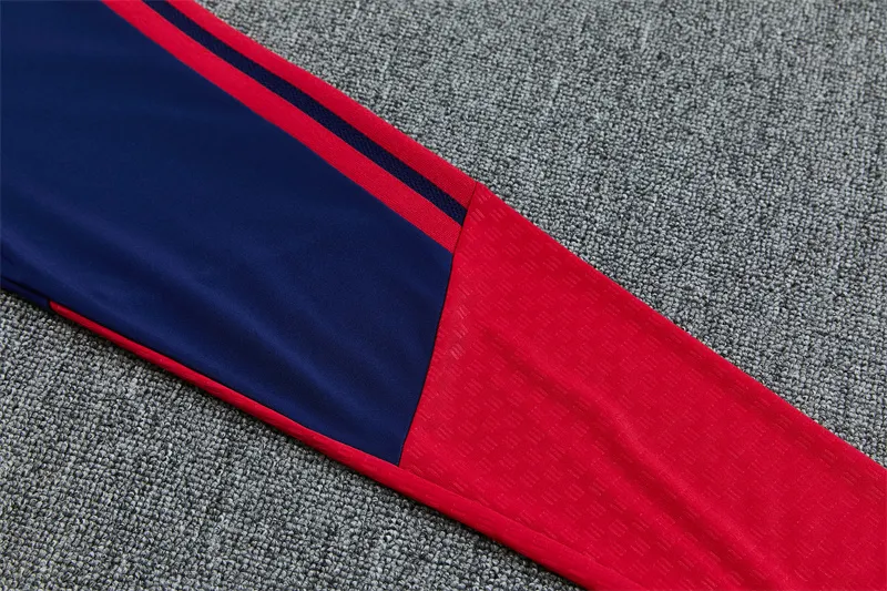 2026-27 Arsenal royal blue half-zip training kit