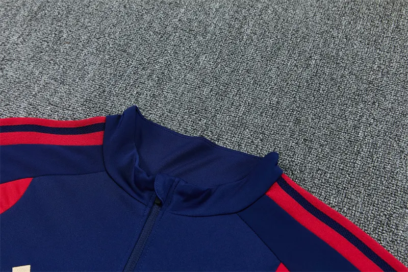2026-27 Arsenal royal blue half-zip training kit