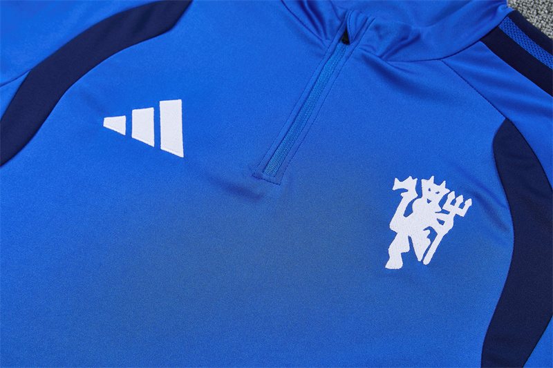 2026-27 Manchester United light blue half-zip training jersey