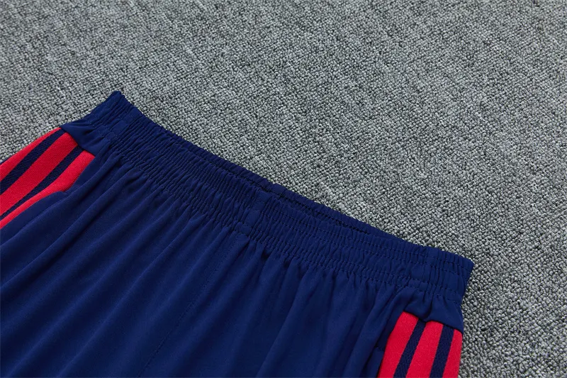2026-27 Arsenal royal blue half-zip training kit