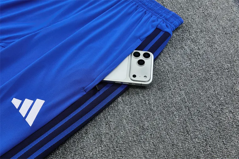 2026-27 Manchester United light blue half-zip training jersey