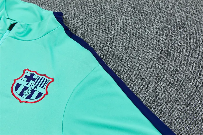 2026-27 Barcelona light blue half-zip training jersey
