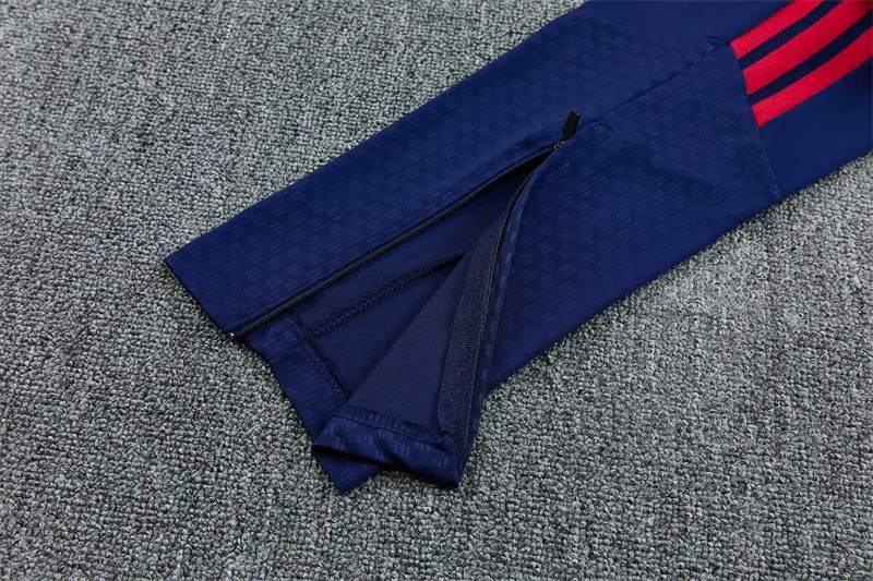 2026-27 Arsenal royal blue half-zip training kit