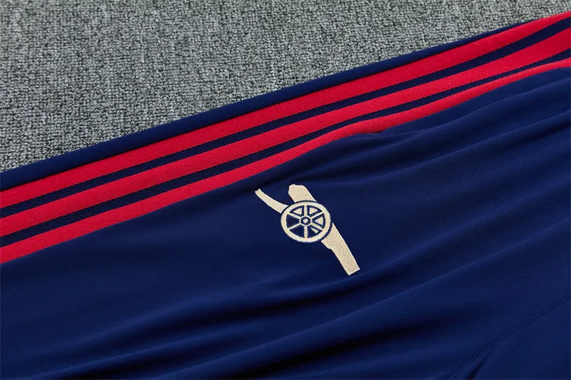 2026-27 Arsenal royal blue half-zip training kit