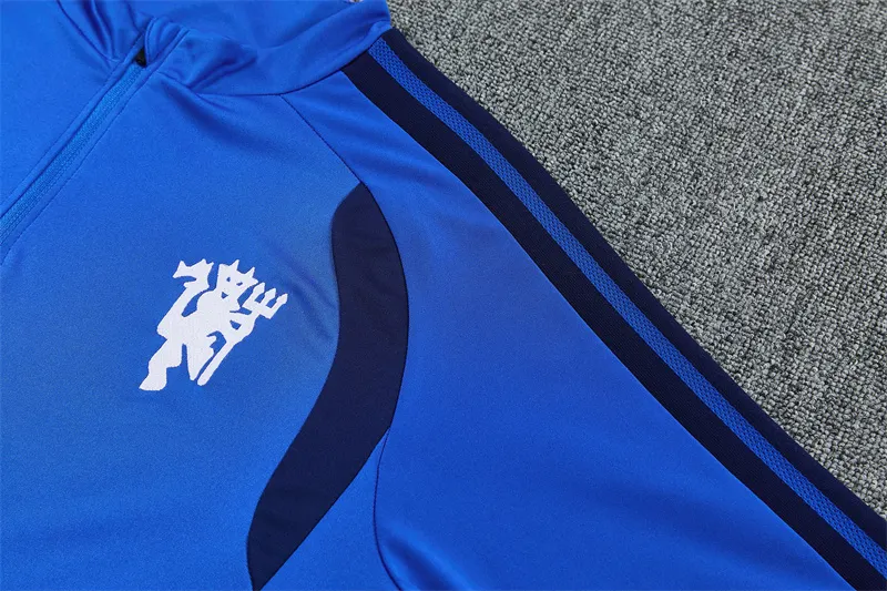 2026-27 Manchester United light blue half-zip training jersey